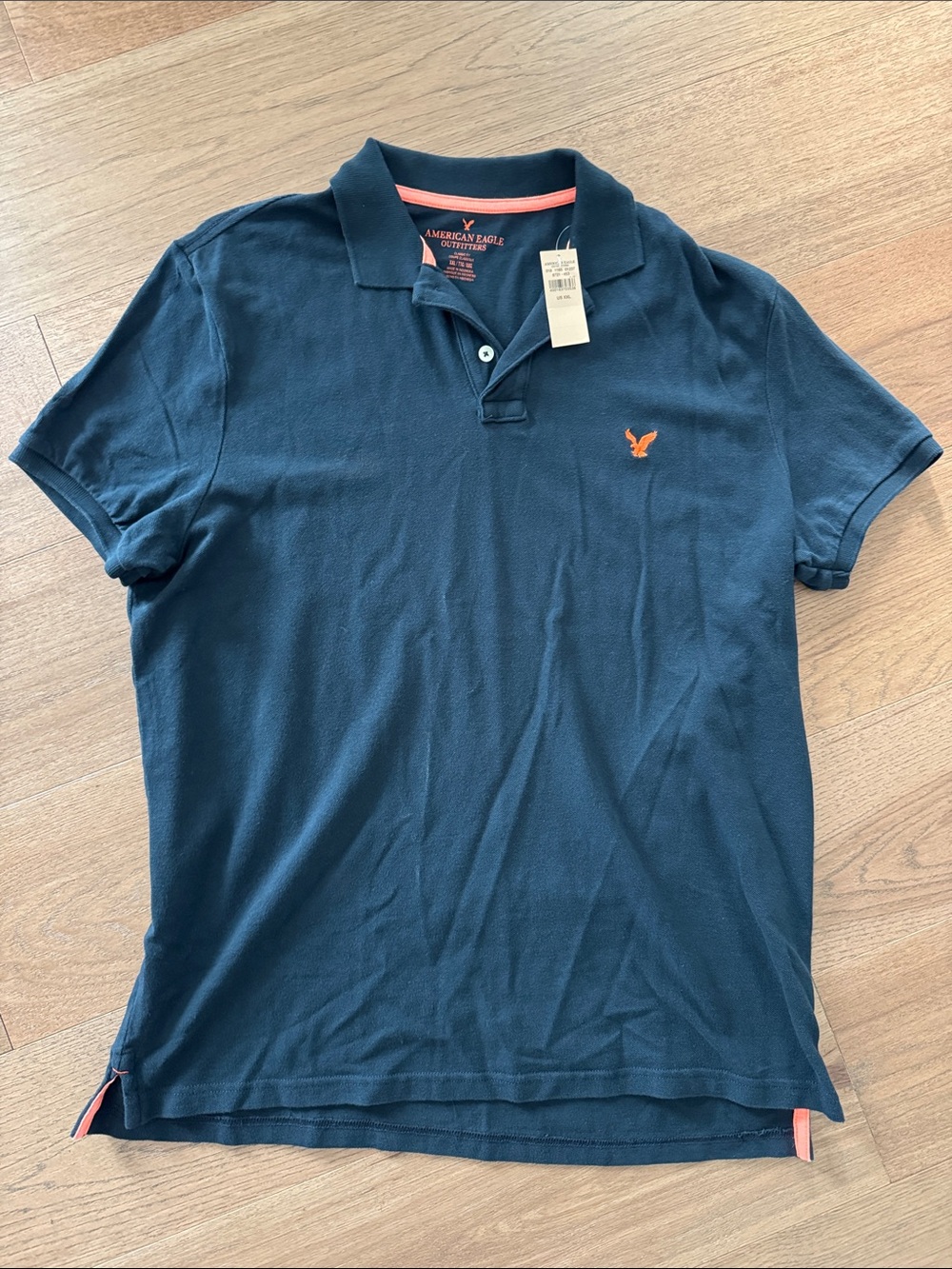 American Eagle Outfitters Men’s Black Polo with Orange Logo